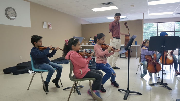 Symphonic Sanctuaries: Orchestra Rouh helps refugees feel they belong